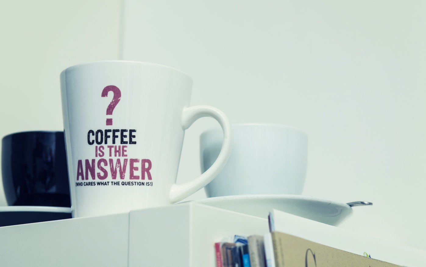 Picture of a cofee mug with a question mug
